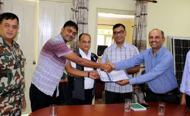 Exchanging signed agreement in presence of RD, PWR Warden and Nepal Army